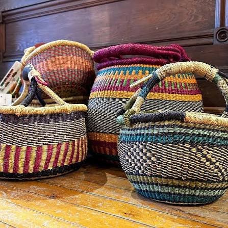Local artisans handweaving baskets