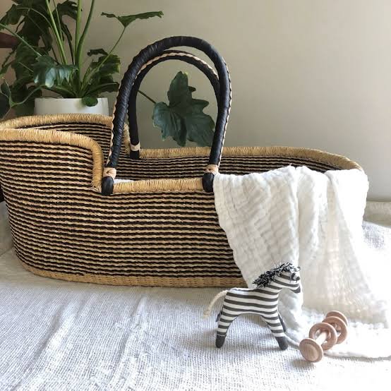 Baskets displayed on wooden shelf