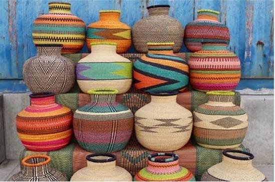 Baskets displayed on wooden shelf
